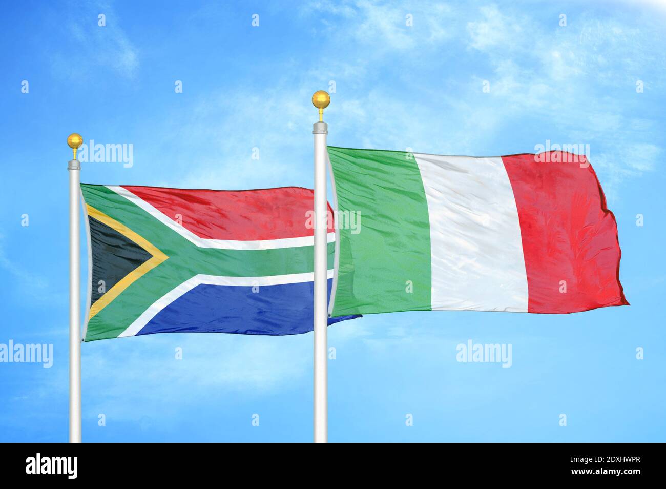 South Africa and Italy two flags on flagpoles and blue sky Stock Photo