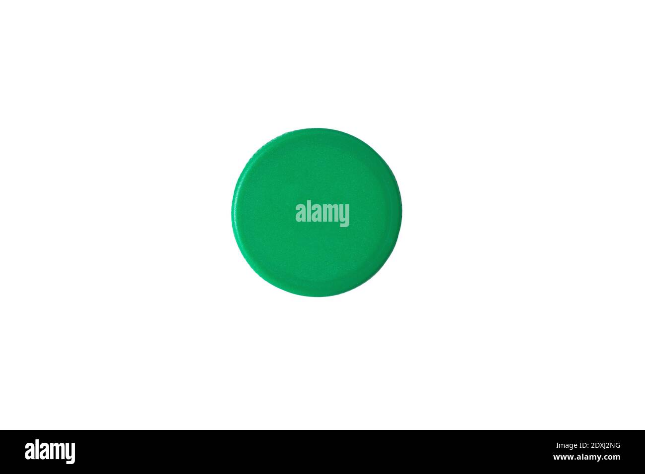Green plastic bottle cap isolated on white background. Top view. Stock Photo