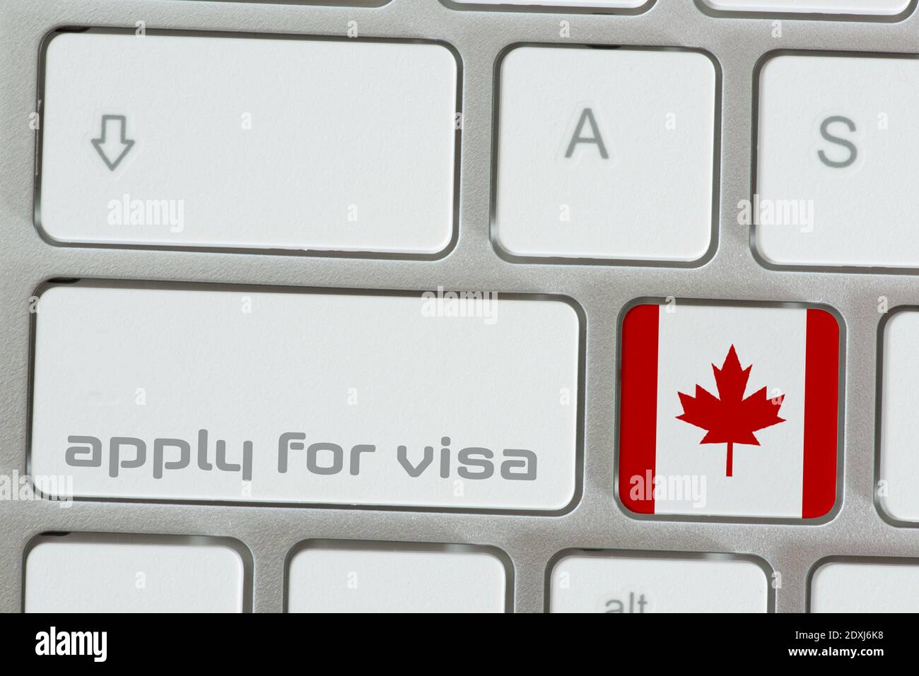 Computer and Canada Visa Application Stock Photo