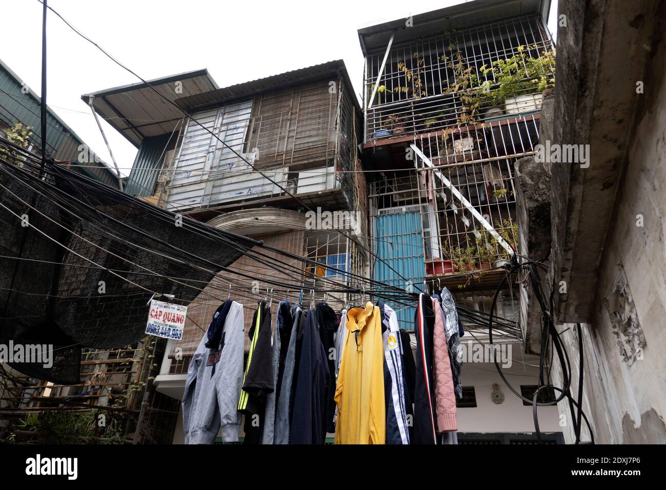 Laundry hung out to dry on power lines in Hanoi Stock Photo
