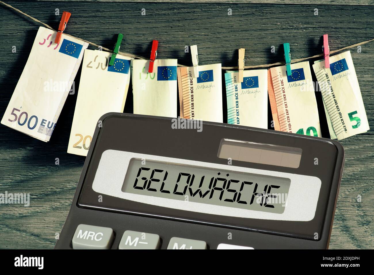 Money laundering, euro money and calculator Stock Photo