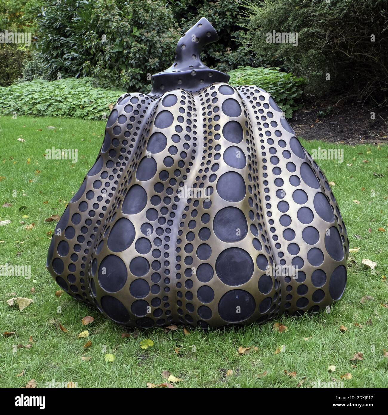 LONDON, UNITED KINGDOM - Oct 18, 2014: A large metal Pumpkin by Yayoi Kusama at the Frieze Art exhibition in Regents Park Stock Photo