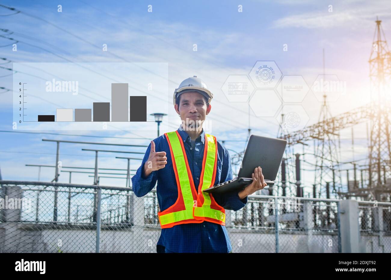 Electric Engineer Holding Computer notebook factory power plant system background Stock Photo