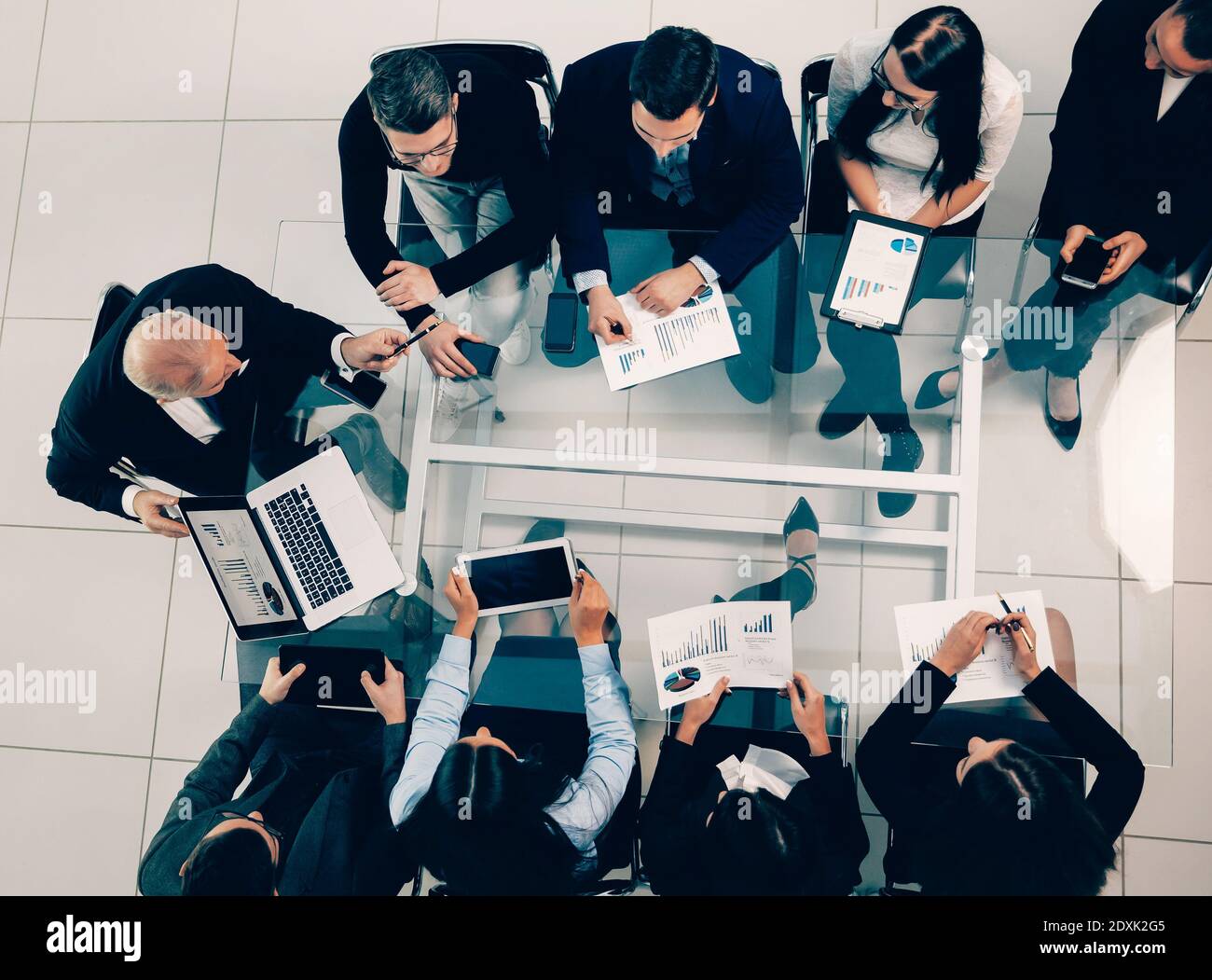business team using a laptop to analyze financial data Stock Photo
