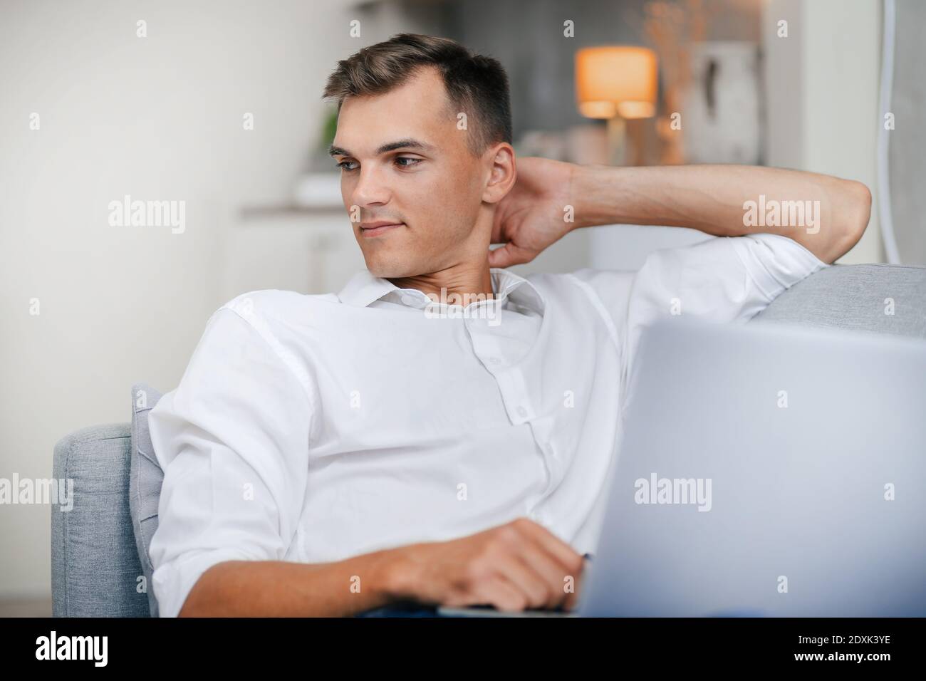 attractive young man using his laptop . people and technology. Stock Photo