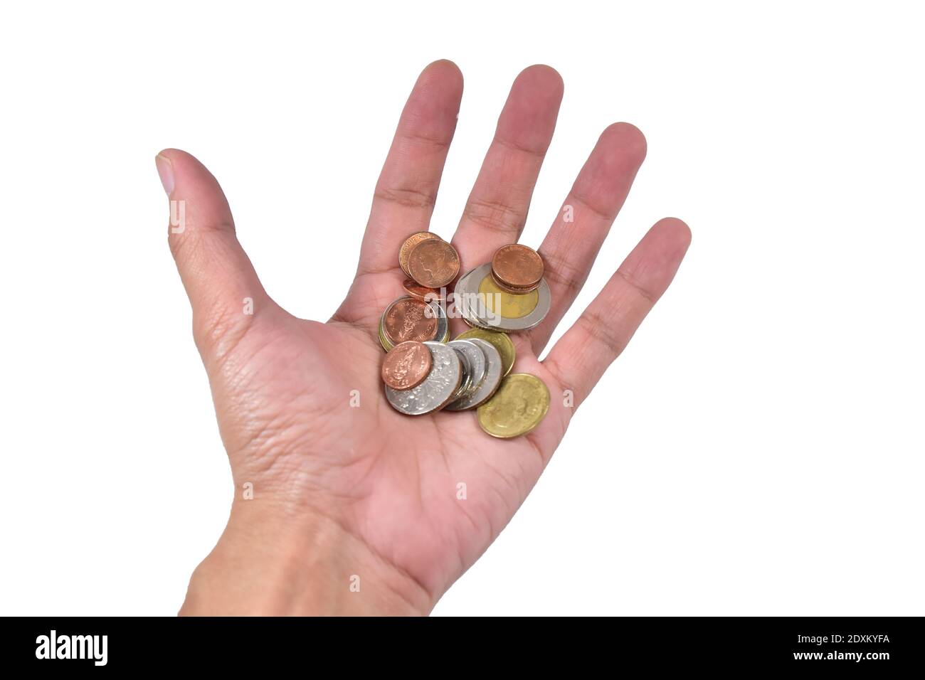 Hand holding Thai baht Coins on white background concept Money finance business currency coin isolated investment clipping path Stock Photo