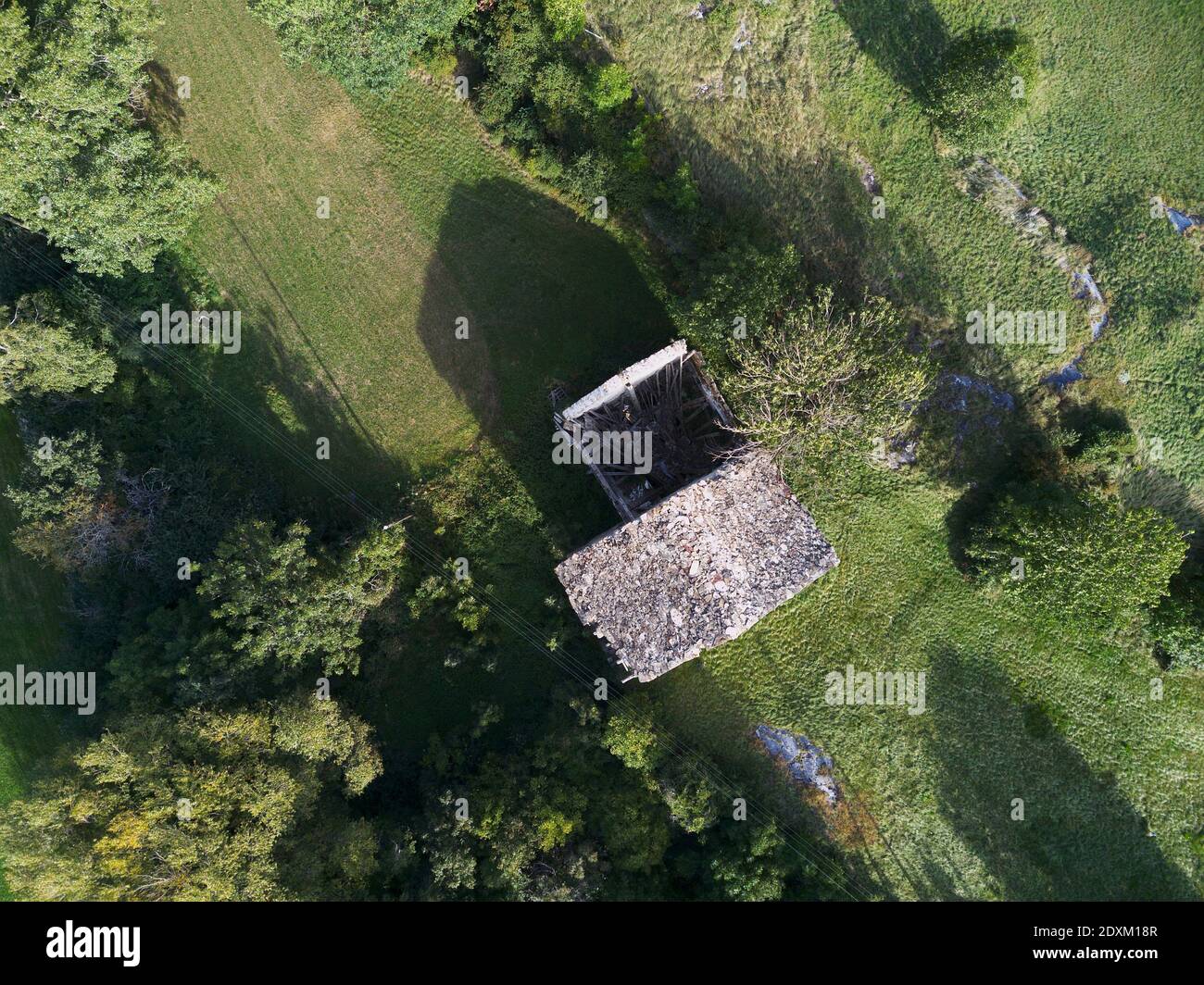 High Angle View Of Sunlight Falling On Farm House Stock Photo