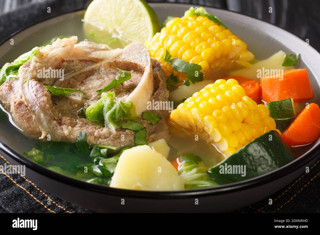 Delicious Mexican beef soup with vegetables close-up in a bowl on the table. horizontal Stock Photo