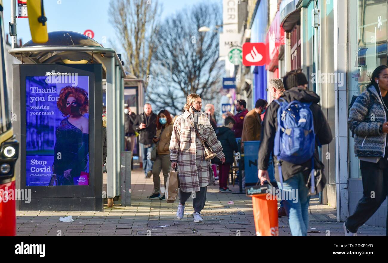 Brighton UK 24th December 2020 - Christmas Eve shoppers out in Brighton today before Sussex goes into coronavirus COVID-19 tier 4 restrictions on Boxing Day : Credit Simon Dack / Alamy Live News Stock Photo