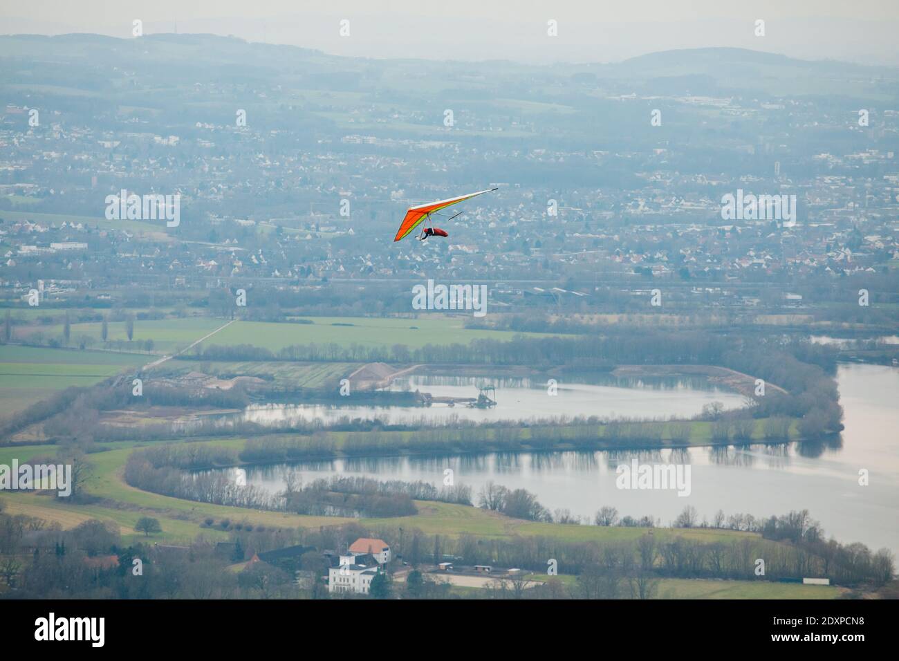 Hang glider in the air on a sunny day. Stock Photo