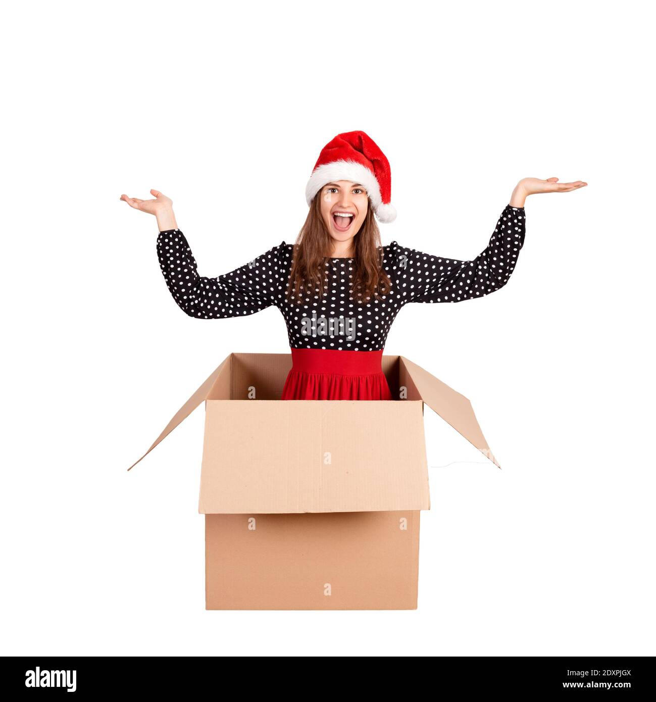Portrait Of Cheerful Young Woman With Arms Raised Sitting In Cardboard ...