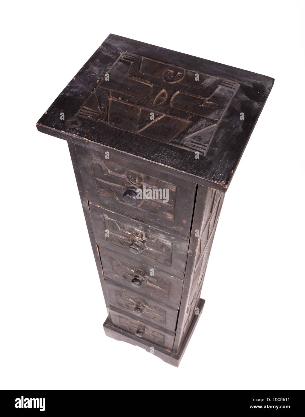 Wooden carved cabinet with 5 drawers, isolated Stock Photo