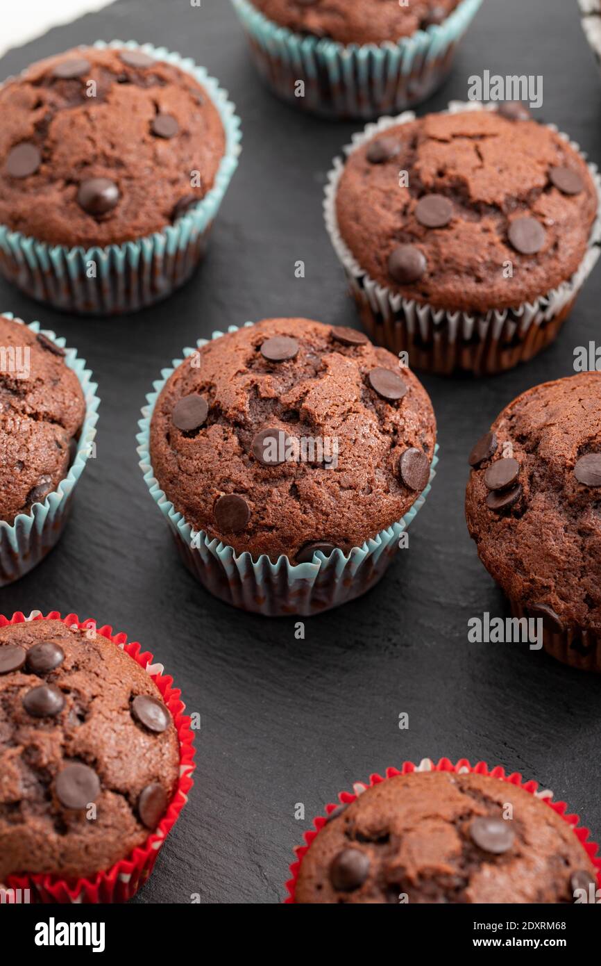 Chocolate muffin. muffin or cup cake with chocolate sprinkles. vertical view. Close-up. Stock Photo