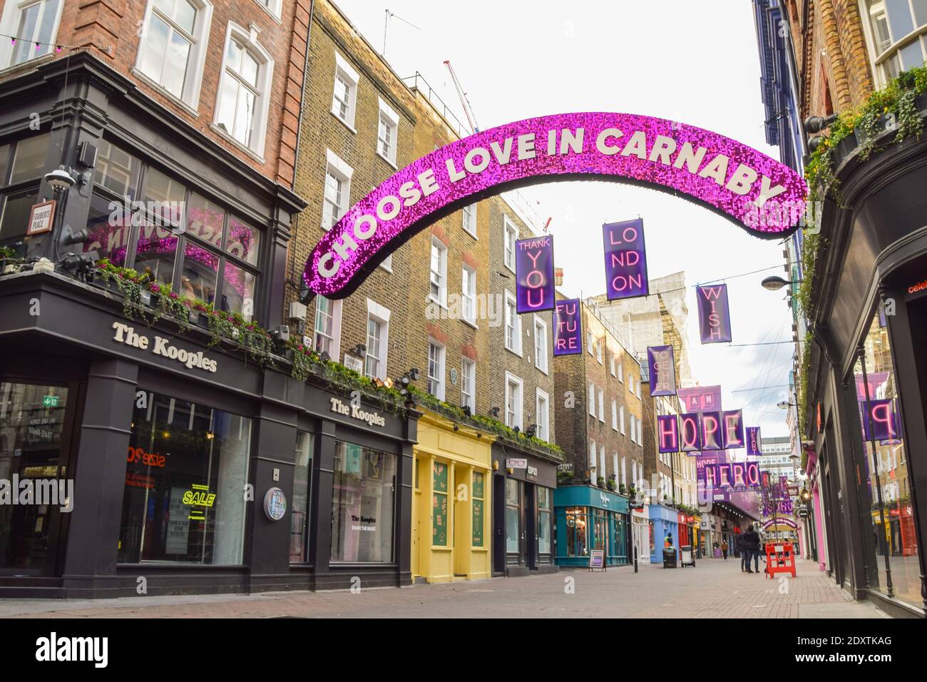 A view of a deserted Carnaby Street, as shops and businesses close once again. London has been placed under Tier 4 restrictions as cases surge and new strains of COVID-19 emerge in England. Stock Photo
