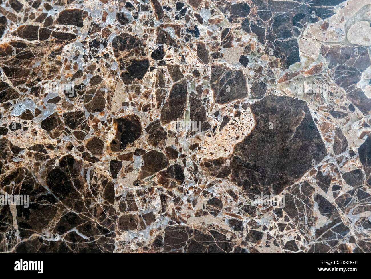 cracked black and beige marble stone background and wall texture Stock Photo
