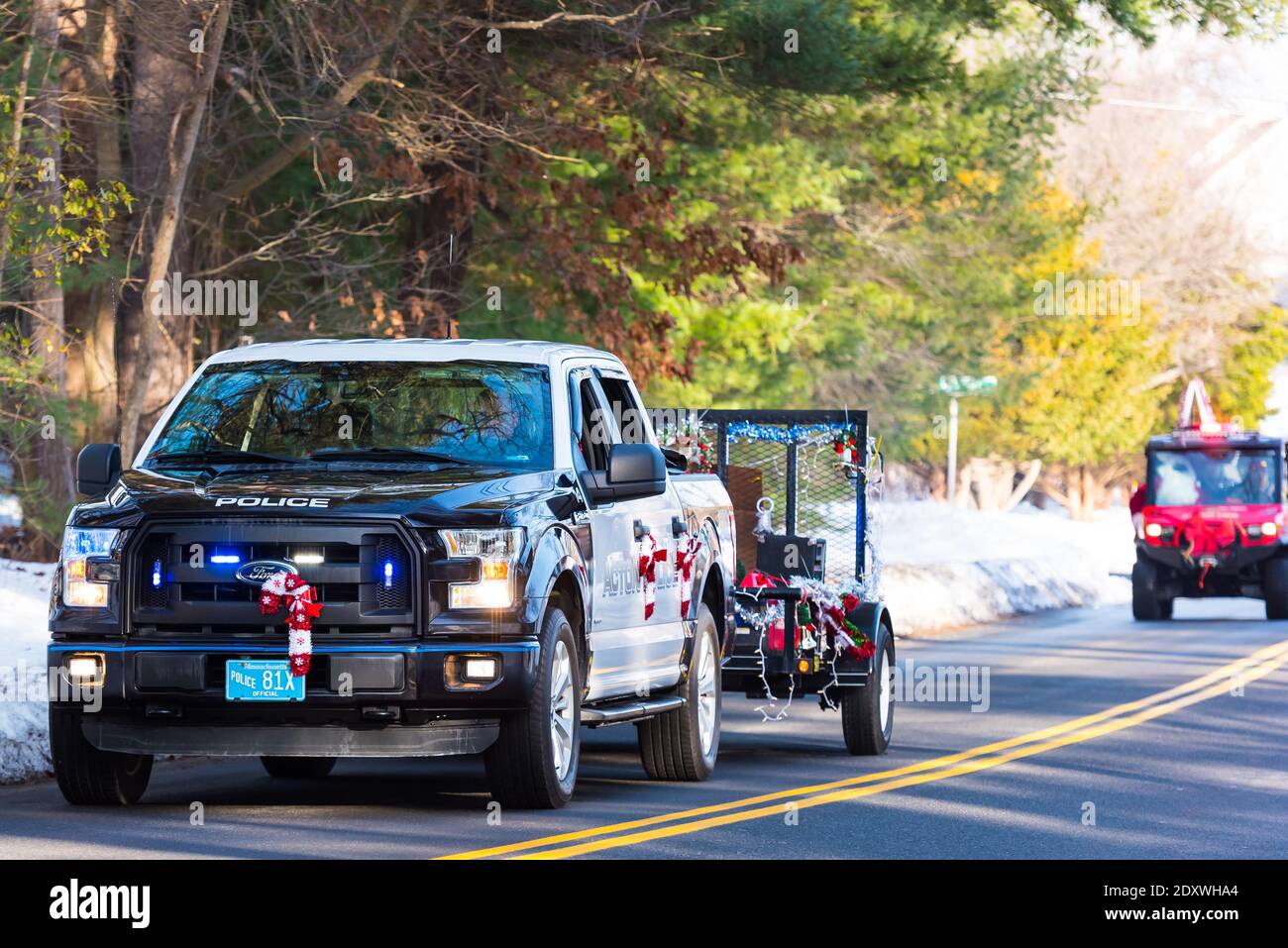 Acton Massachusetts Police leading parade with Santa Claus Stock Photo