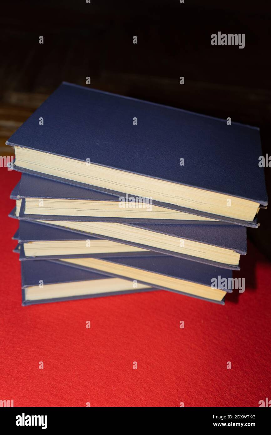 Old books are stacked on top of each other. Stack of books. Spines of