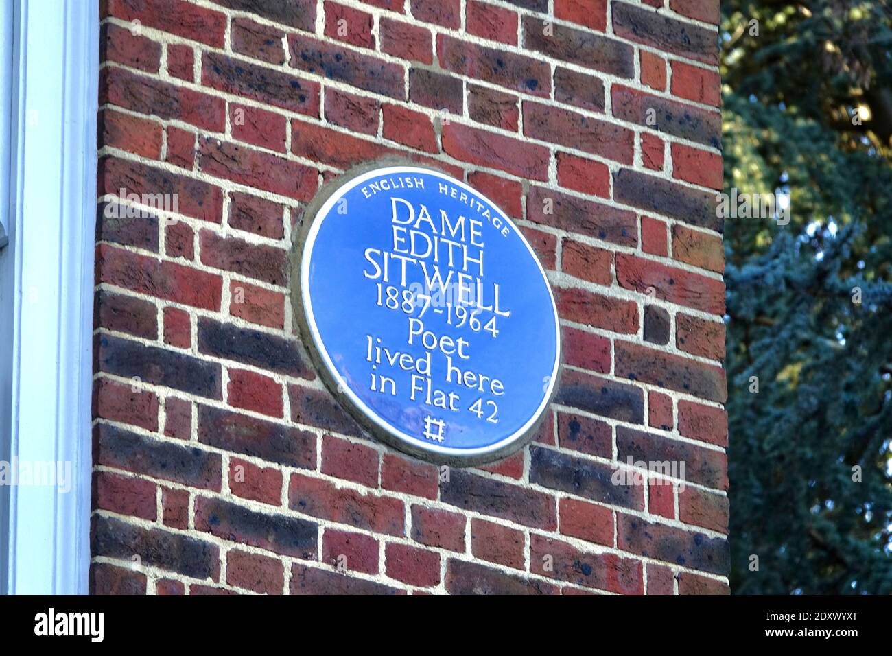 Dame Edith Sitwell, poet, blue plaque erected by English Heritage on Hampstead High Street, London. Stock Photo