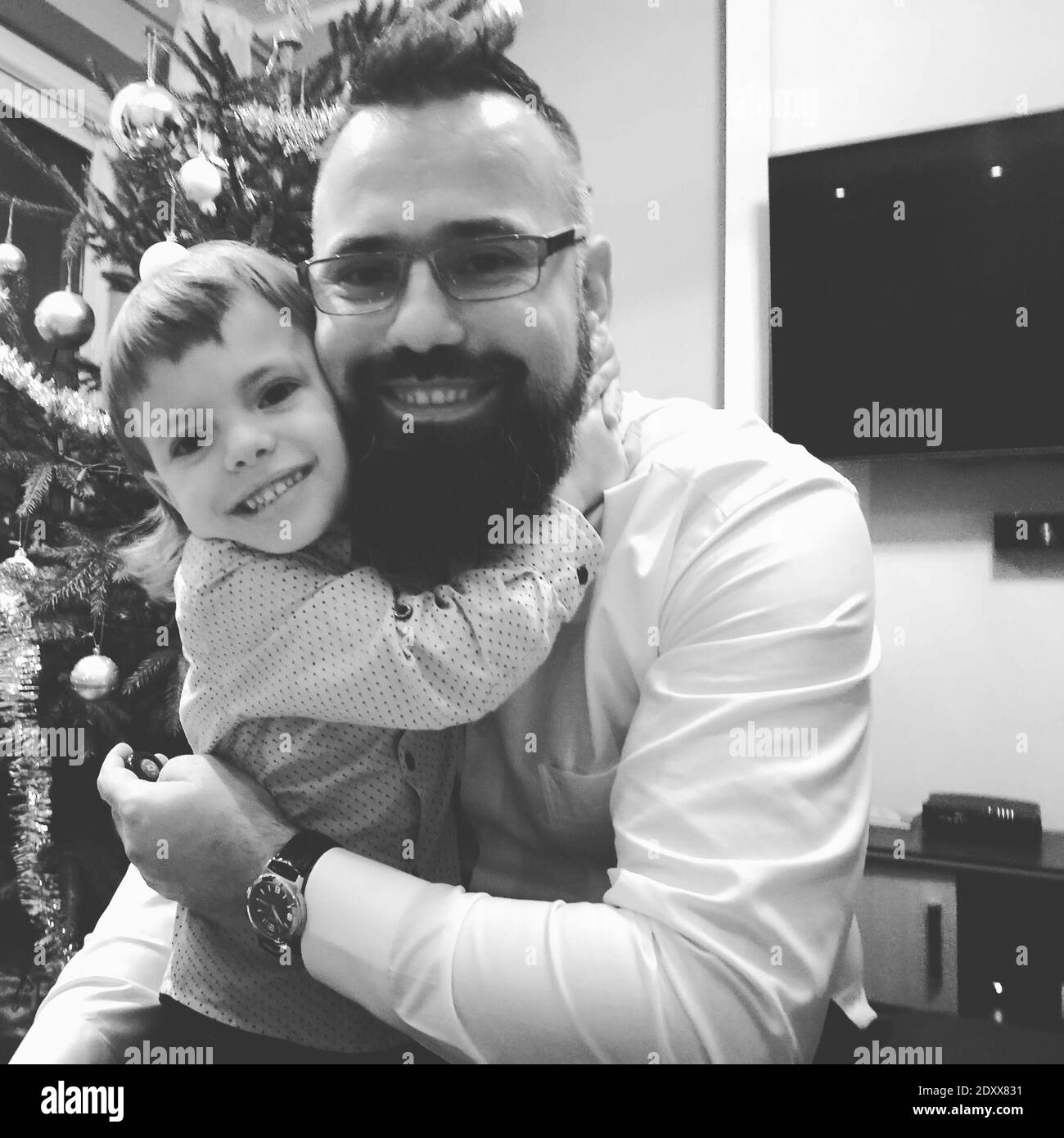 Father adult son smiling camera Black and White Stock Photos & Images ...