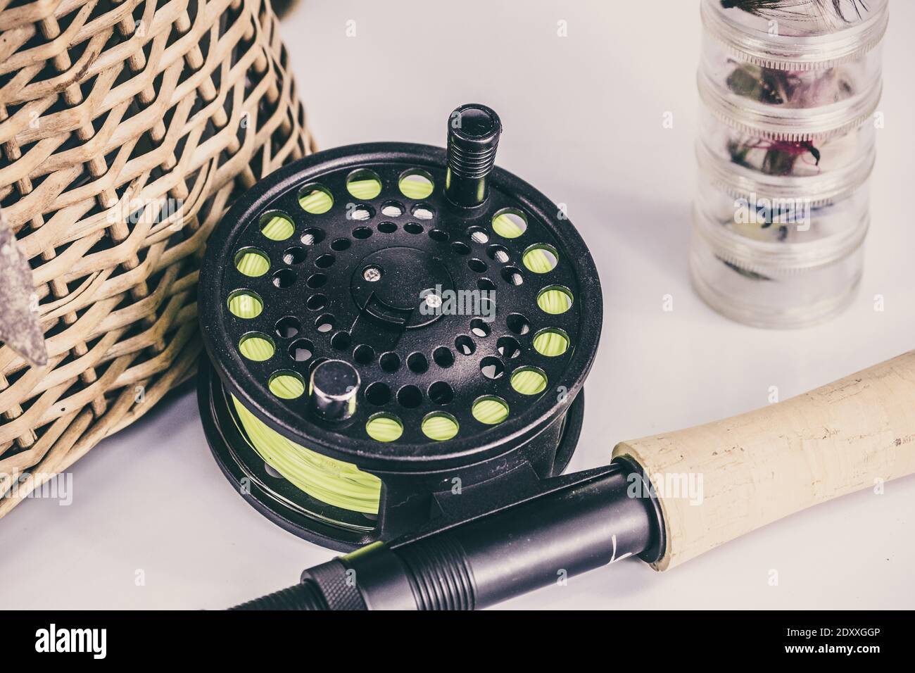 A fly fishing rod and reel with a fisherman