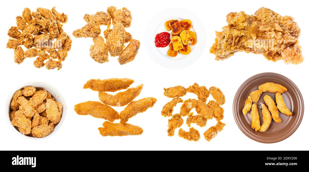 collection of various deep fried chicken pieces (nuggets, strips, wings, etc) isolated on white background Stock Photo