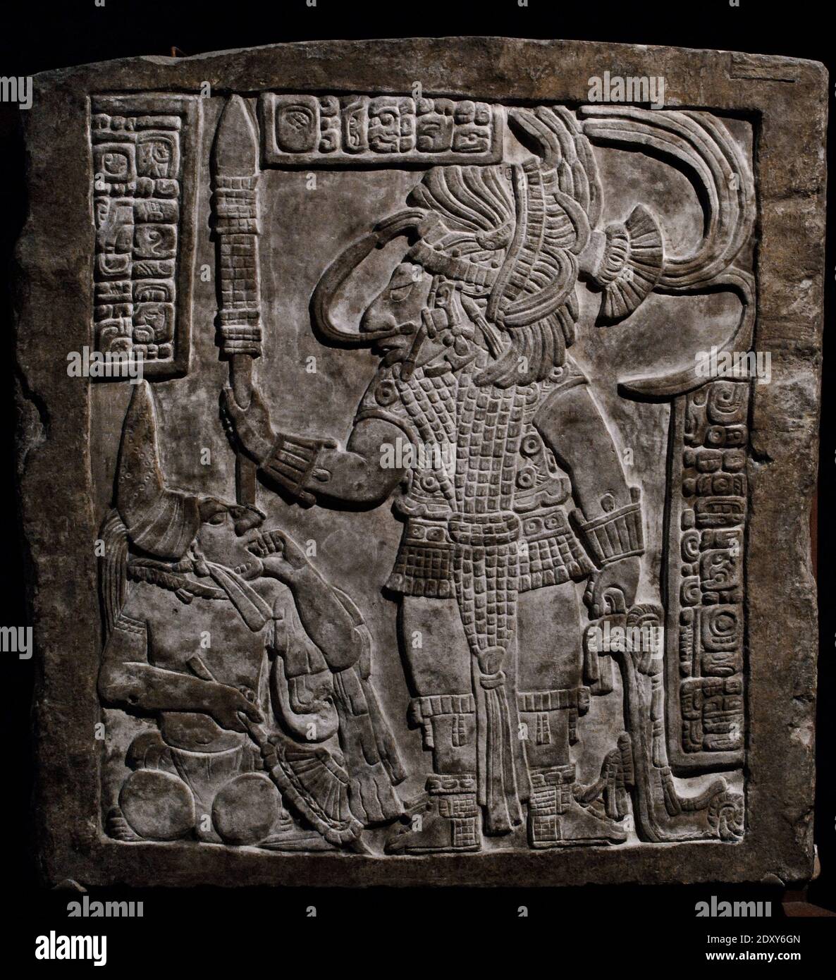 The Yaxchilan Lintels. Lintel 16 (commissioned by Bird Jaguar IV for Structure 21), 755-770 AD. Maya, Late Classic period. Limestone (76,2 x 75,7 cm). Scene depicting king Bird Jaguar IV and a captive at his feet. Chiapas, Mexico. British Museum. London, England, United Kingdom. Stock Photo