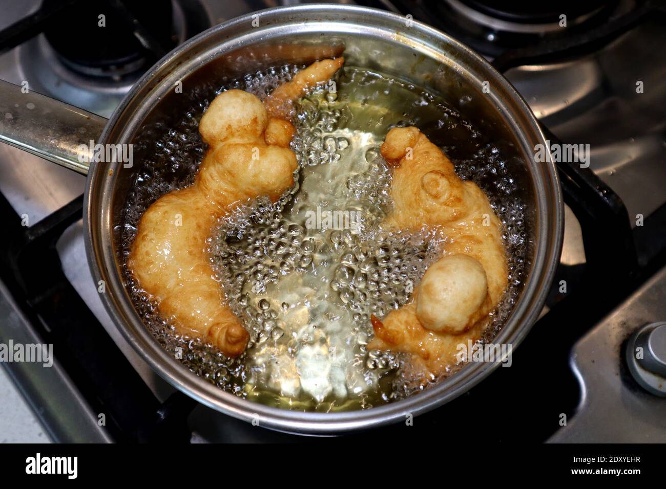 SFINCI Traditional Sicilian Italian Fried Doughnuts while frying in