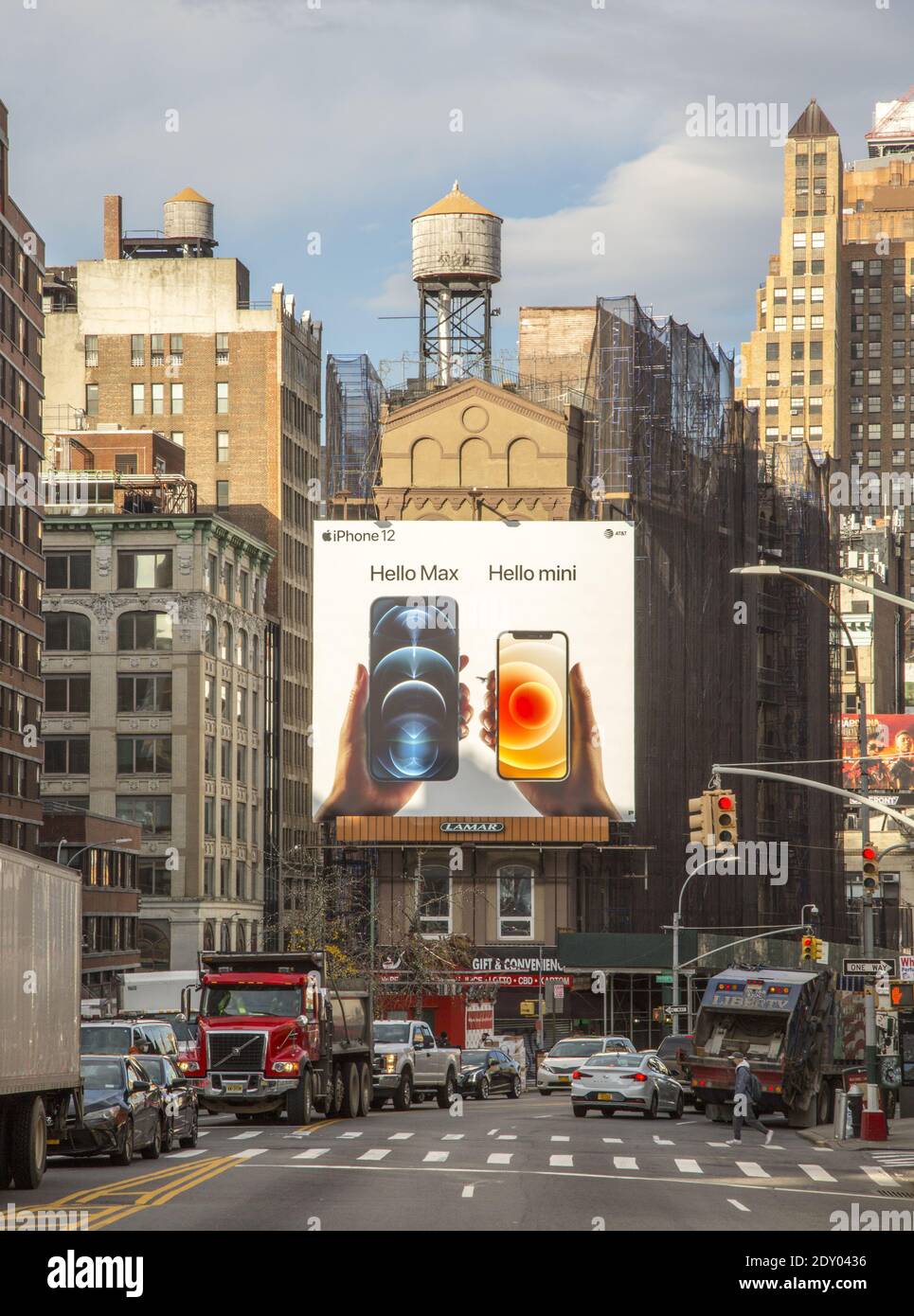 iphone billboard stands out on Canal Street in Manhattan surronded by New York rooftops, classic water towers and all. Stock Photo