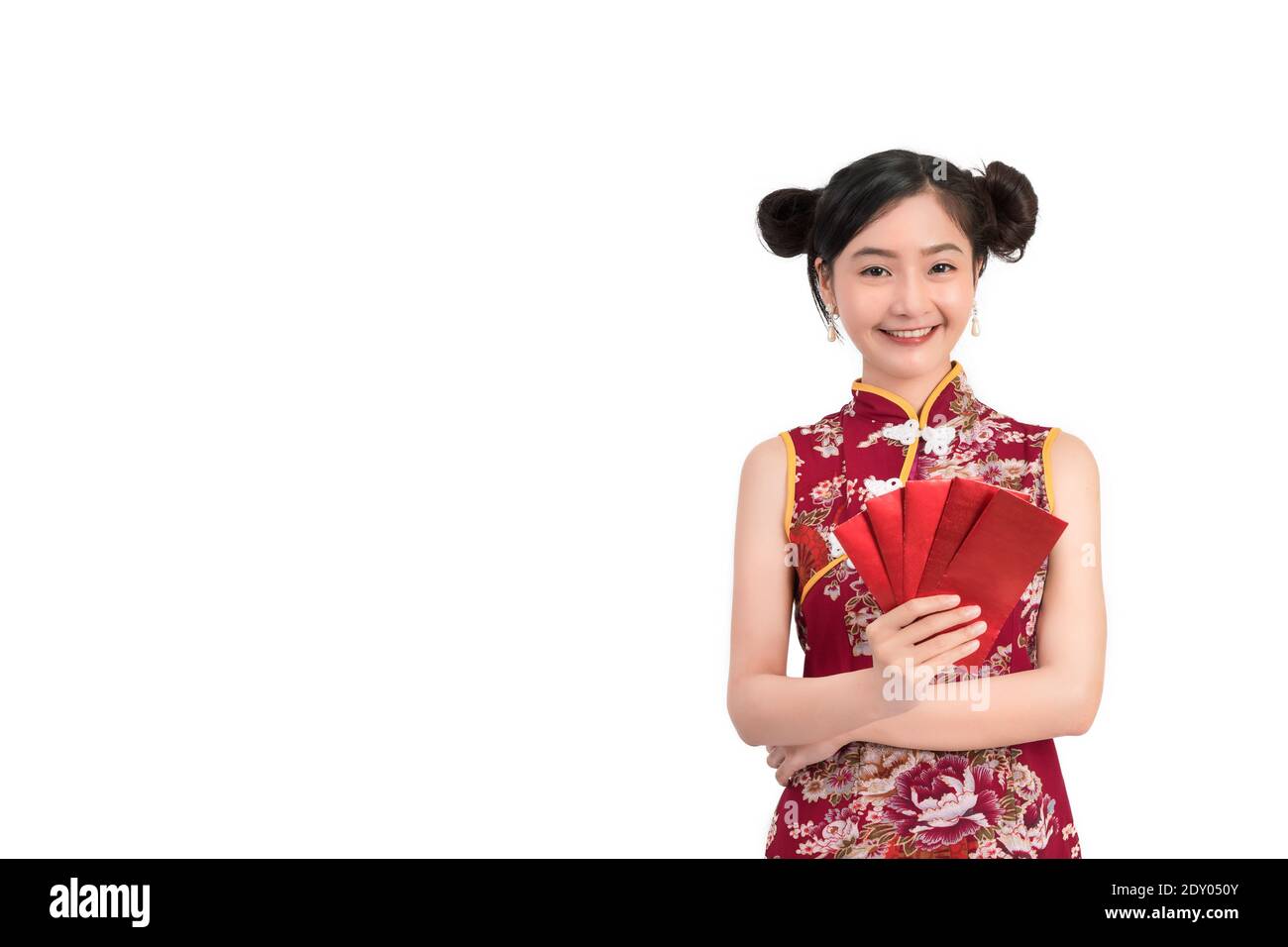 Portrait Of Beautiful Woman Wearing Chinese Dress Holding Envelopes Against White Background Stock Photo