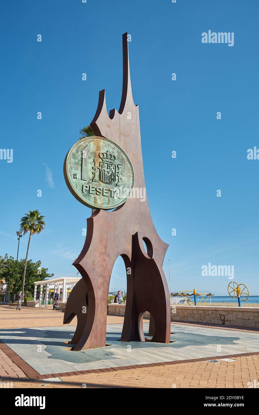 Monument to the Peseta, wich was replaced in 2002 by the Euro. Los Boliches, Fuengirola, Malaga province, Andalusia, Spain. Stock Photo