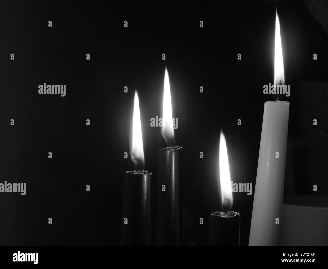 Closeup Of Lit Candles In Darkroom Stock Photo Alamy