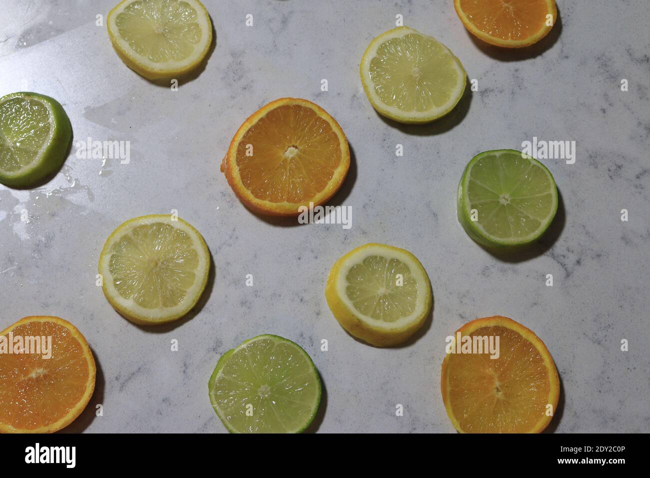 citrus lined up in a line. good background Stock Photo - Alamy