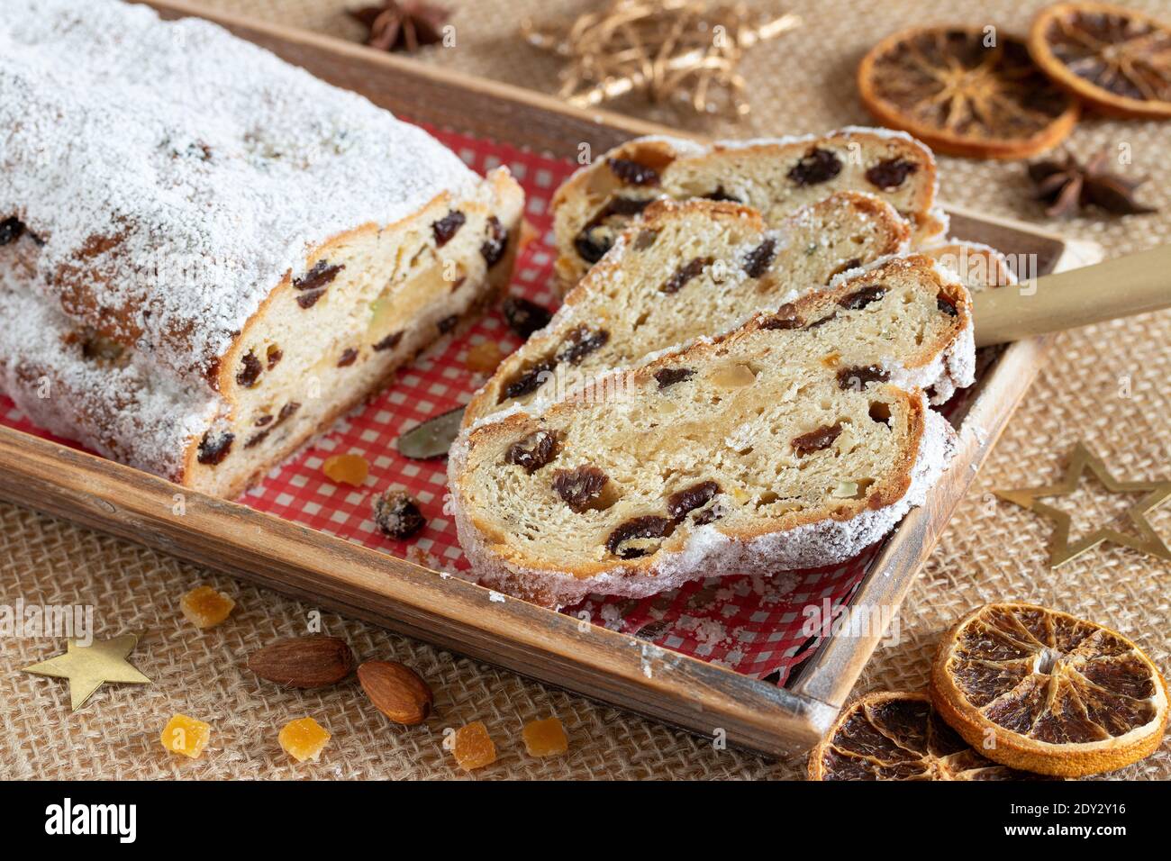 christmas stollen on wooden tray Stock Photo