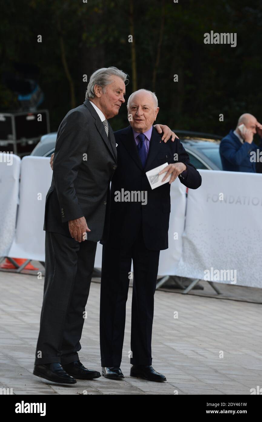 Alain Delon and Pierre Berge arriving at the Louis Vuitton art