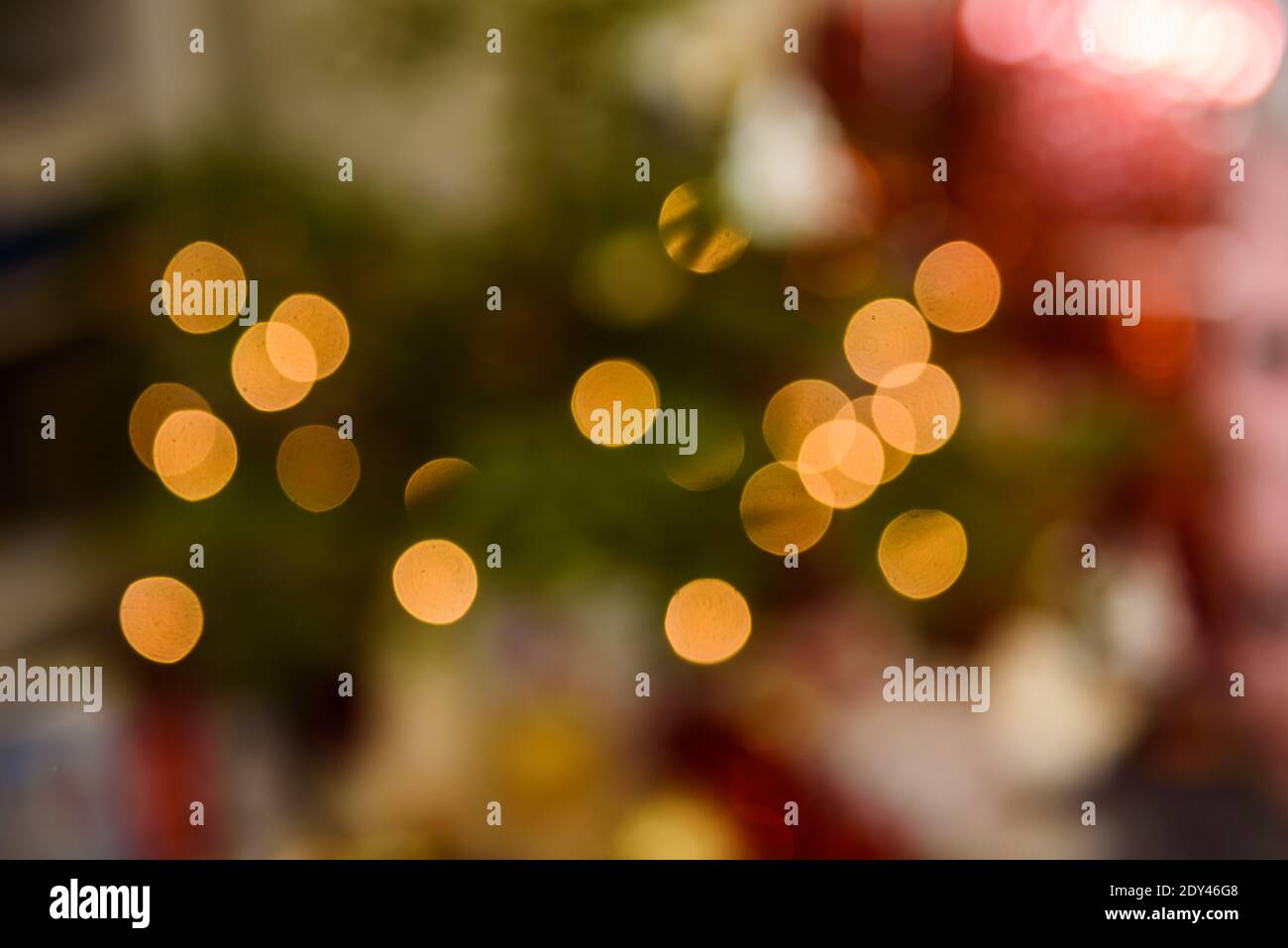 Blurred Christmas bokeh lights. Abstract holiday background. Stock Photo