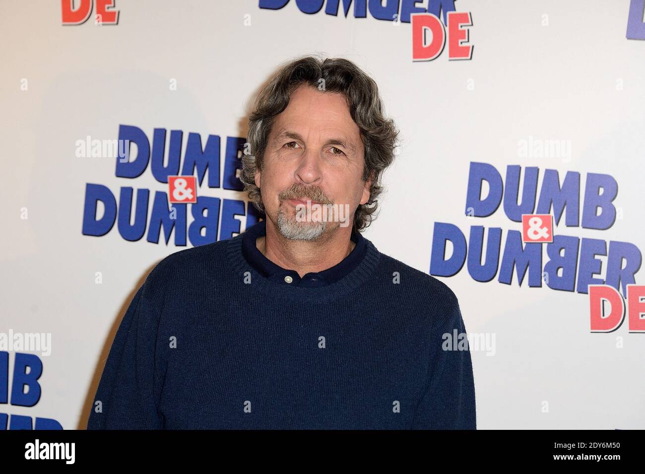 Peter Farrelly poses at a photocall for the film Dum And Dumber To at