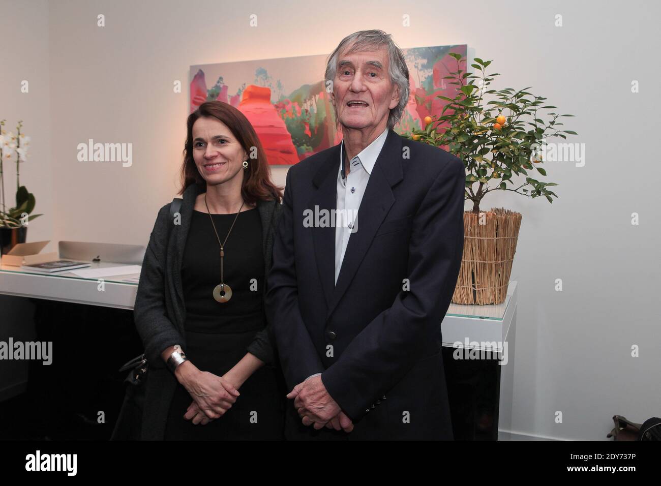Former French Minister of Culture Aurelie Filippetti and Nils-Udo pose ...