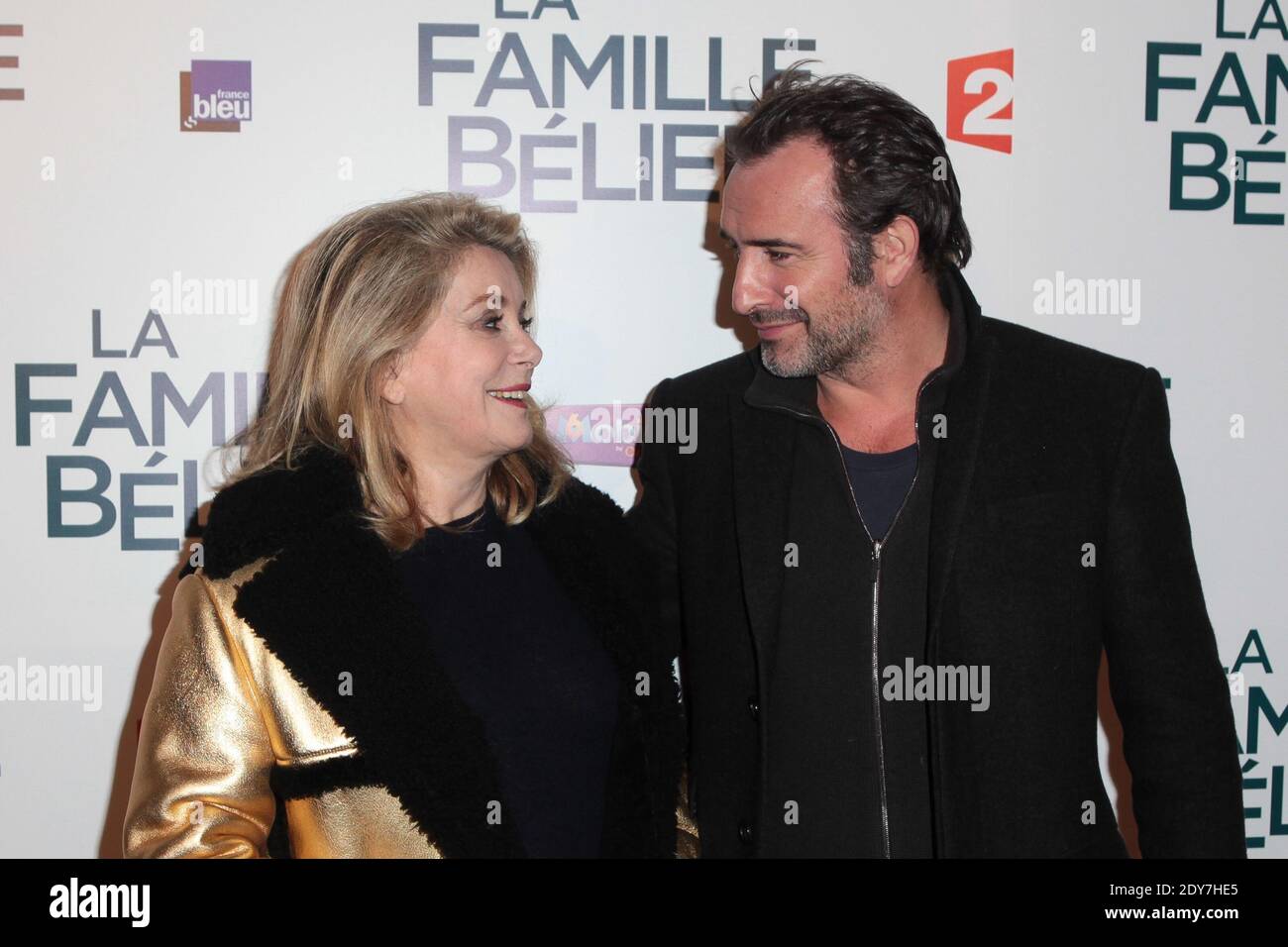 Catherine Deneuve and Jean Dujardin attending the French Premiere of the  Movie "La famille Belier" held at Cinema Le grand Rex in Paris, France, on  December 09, 2014. Photo by Audrey Poree/ABACAPRESS.COM