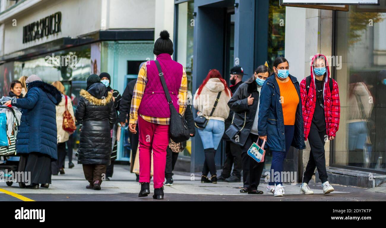 Birmingham, UK - Shoppers wearing face masks on November 4th 2020 the last day before a month-long lockdown into December. Stock Photo