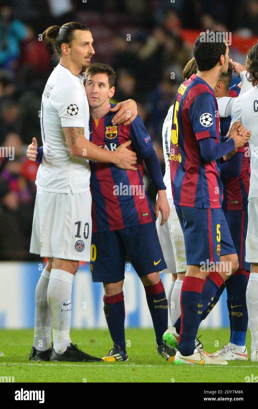 PSG's Zlatan Ibrahimovic with Barcelona's Lionel Messi during the UEFA  Champions League soccer match, FC Barcelona Vs Paris Saint-Germain at Camp  Nou in Barcelone, Spain on December 10, 20114. Barcelona won 3-1.
