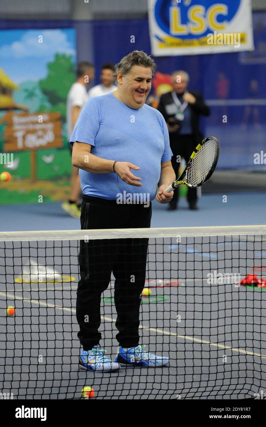 Pierre Menes attending Sourire Gagnant event by Enfant Star and Match  association at Levallois Sporting Tennis Club near Paris, France on  December 18, 2014. Photo by Alban Wyters/ABACAPRESS.COM Stock Photo - Alamy