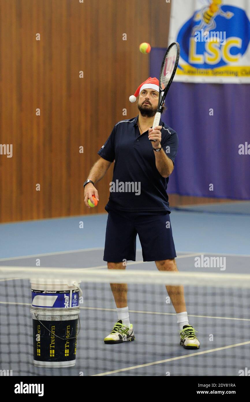Henri Leconte attending Sourire Gagnant event by Enfant Star and Match  association at Levallois Sporting Tennis Club near Paris, France on  December 18, 2014. Photo by Alban Wyters/ABACAPRESS.COM Stock Photo - Alamy