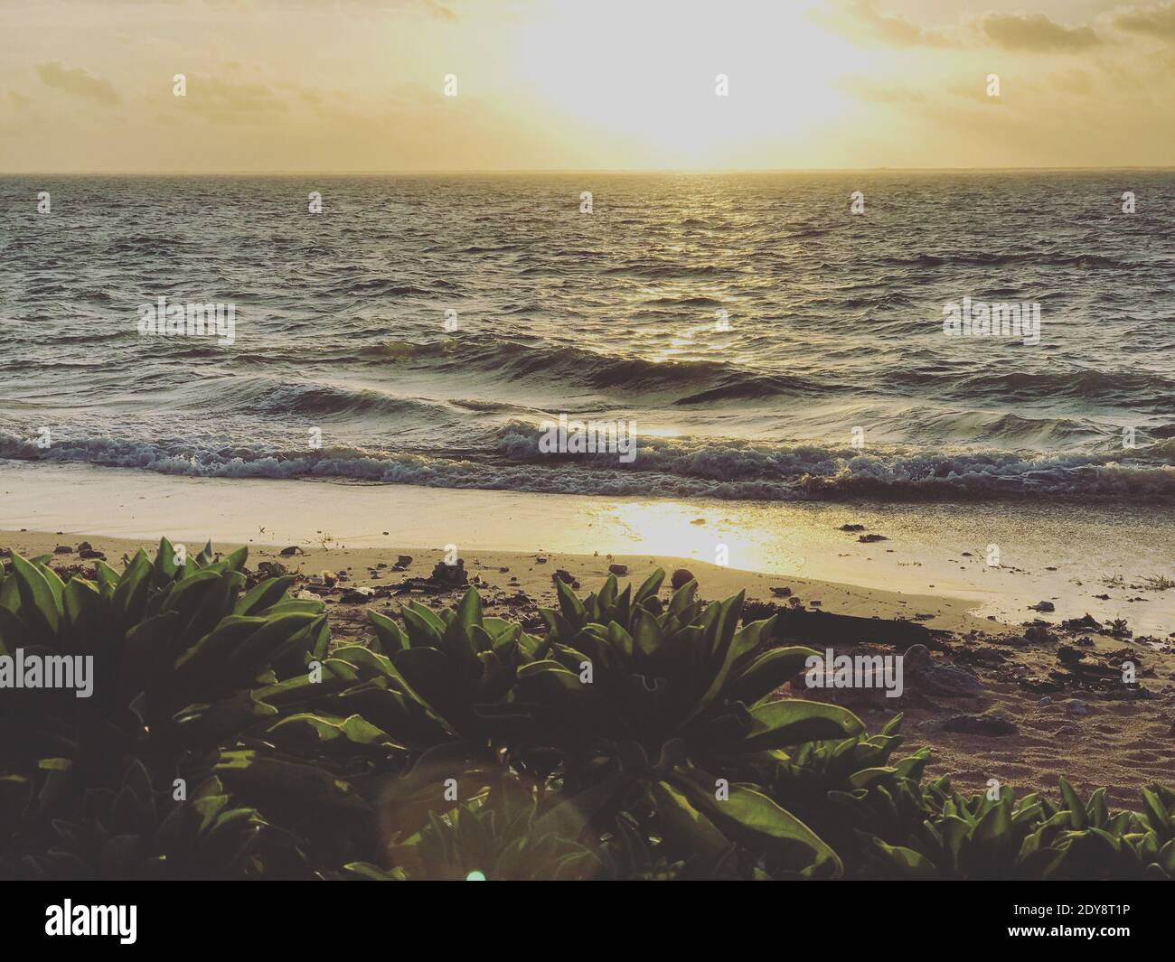Scenic View Of Sea Against Sky During Sunset Stock Photo