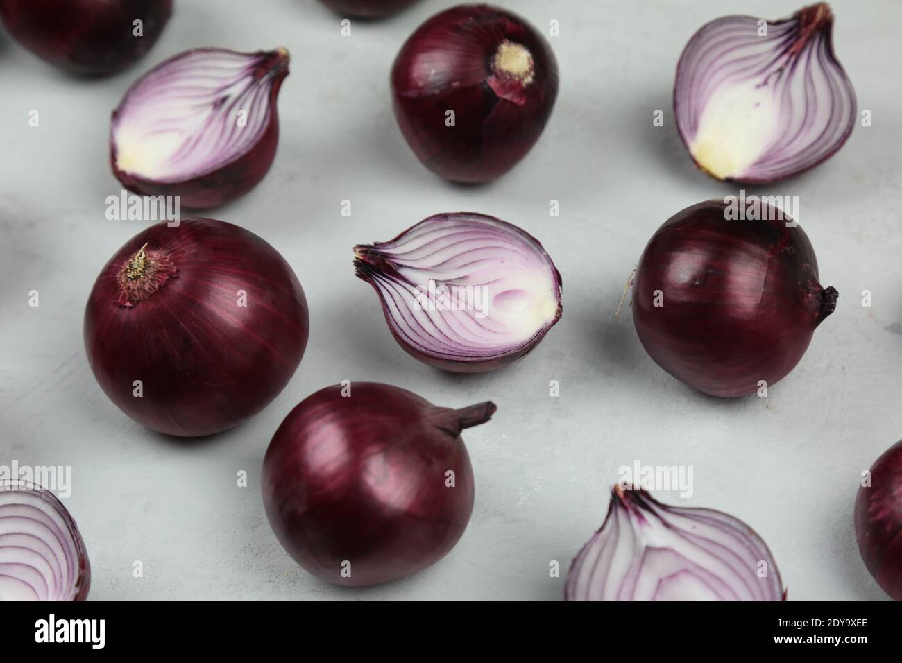 sweet red onions on background Stock Photo