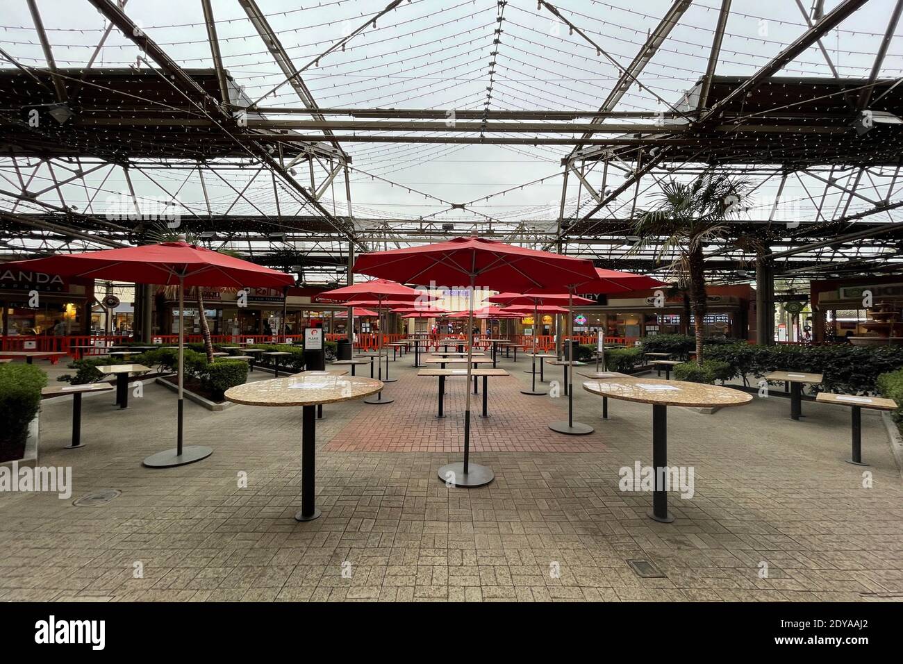 A closed food court dining area at the Citadel Outlets amid the global A closed food court dining area at the Citadel Outlets amid the global