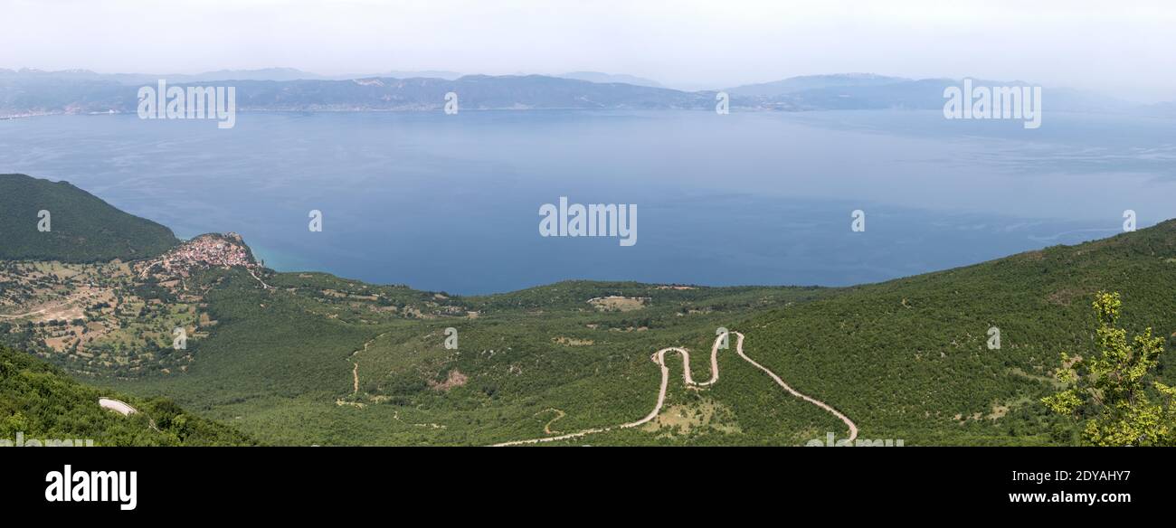 View from Koritski Ridge, Mount Galicia National Park, town of Trpejca, Lake Ohrid & mountain road, Macedonia, (FYROM)), Republic of Northern Macedoni Stock Photo