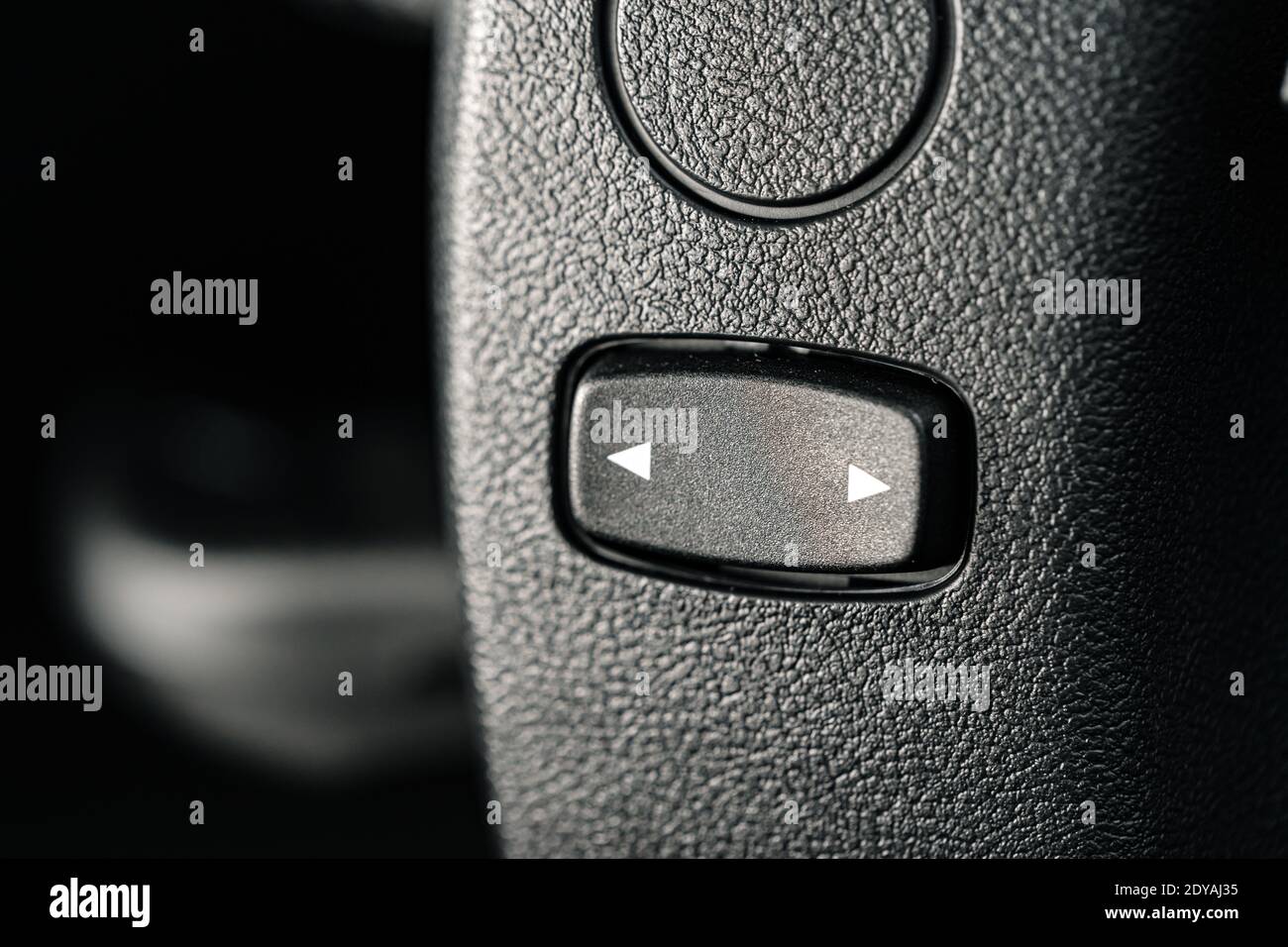 Arrows button in a car close up Stock Photo Alamy