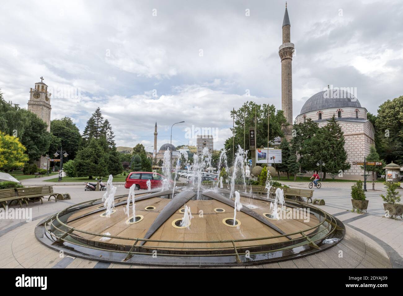 Fountain in Magnolia Square, Clock Tower, Yeni and Ishok (Isak) Mosques, Shirok Sokok, (formerly Marshal Tito street), Bitola, Macdonia, (FYROM)), Rep Stock Photo