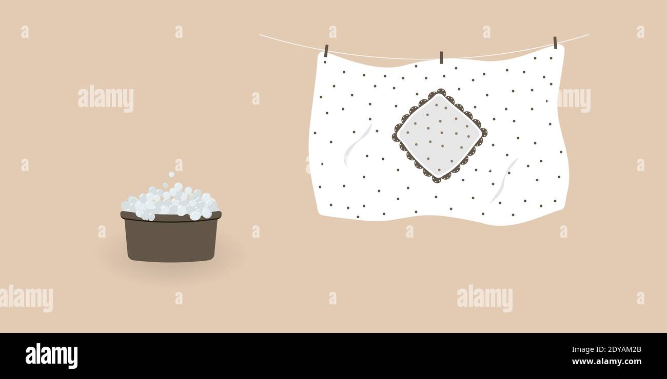 Concept of washing and drying: washed cute white duvet cover with brown polka dots.Blanket cover hanging on clothesline Stock Photo