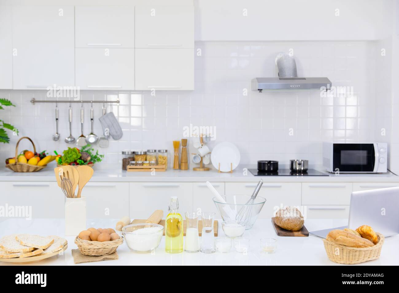 clean new modern kitchen interior with homemade bread decoration on the table top for background Stock Photo
